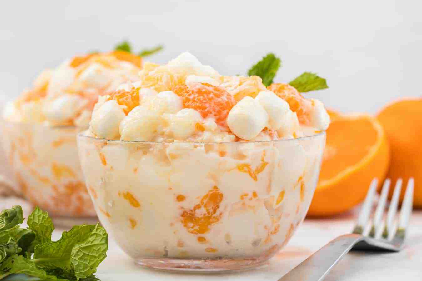 This tasty and creamy 6-cup ambrosia fruit salad is the simplest thing to make and is forever a hit for kiddos and adults alike at any gathering! #ambrosiafruitsalad #fruitsalad #fruit #fruitrecipes #salad #southerndishes #fruitsaladrecipe