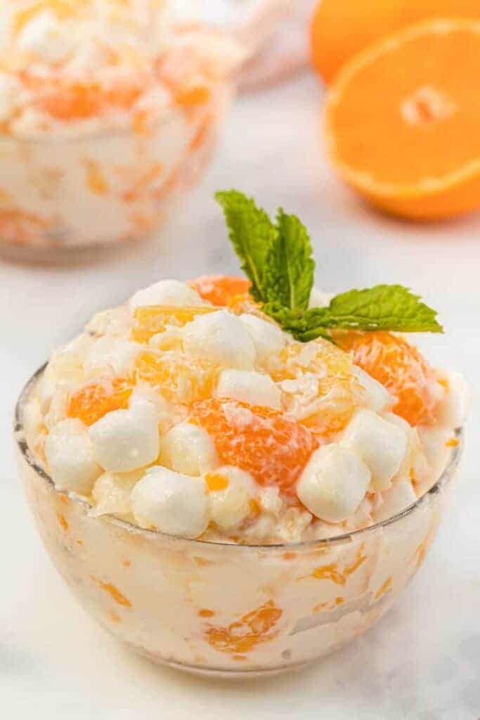 oranges and marshmallows in a "6 cup salad" in a glass dish