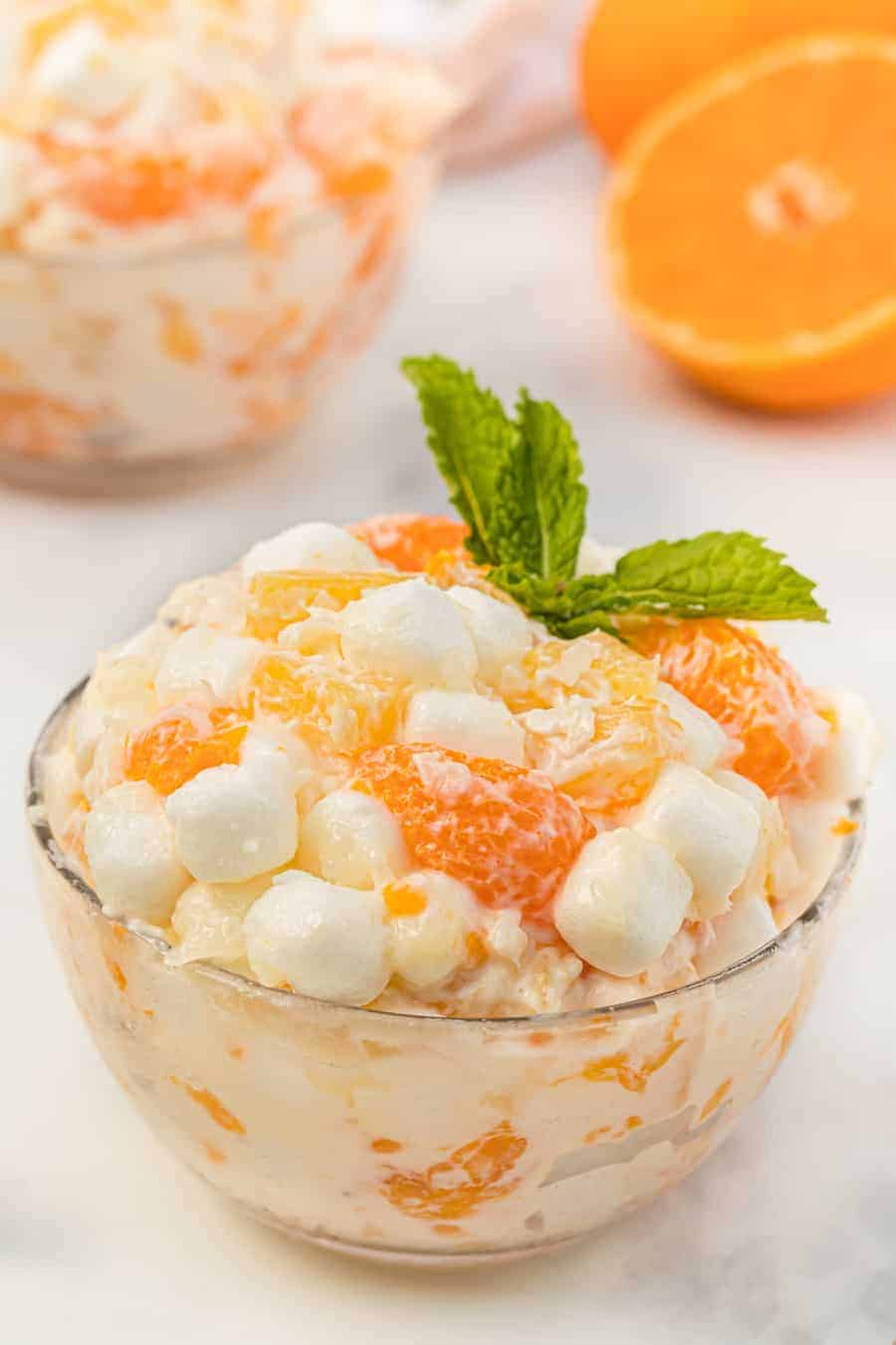This tasty and creamy 6-cup ambrosia fruit salad is the simplest thing to make and is forever a hit for kiddos and adults alike at any gathering! #ambrosiafruitsalad #fruitsalad #fruit #fruitrecipes #salad #southerndishes #fruitsaladrecipe