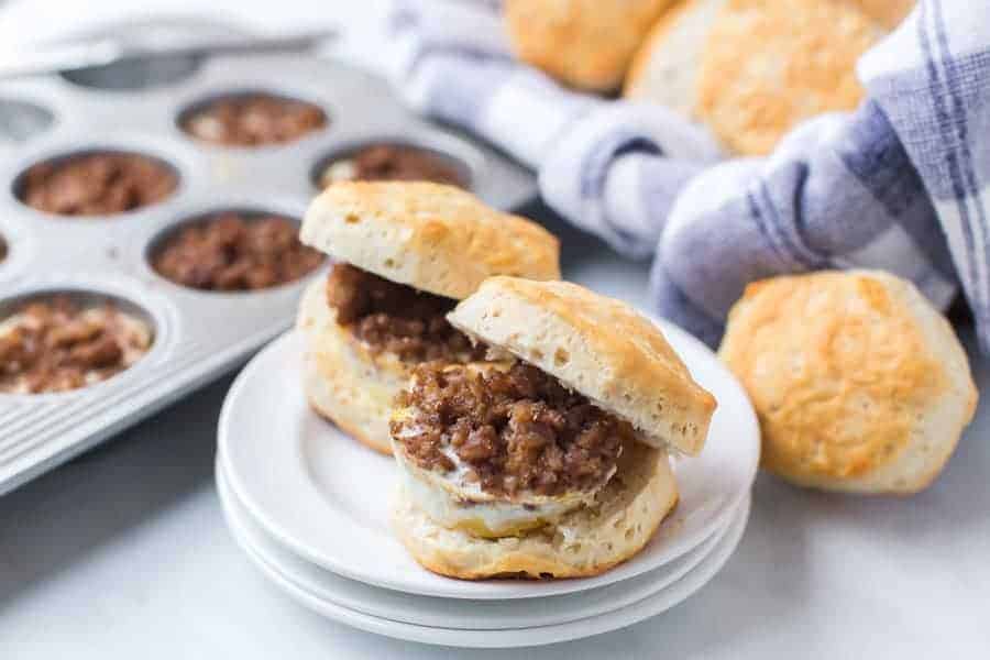 These easy breakfast biscuit sandwiches for a crowd are so simple to throw together for a brunch or if you have visitors, and they're hearty and delicious! #breakfastsandwich #breakfastsammies #breakfast #savorybreakfasts #sandwich