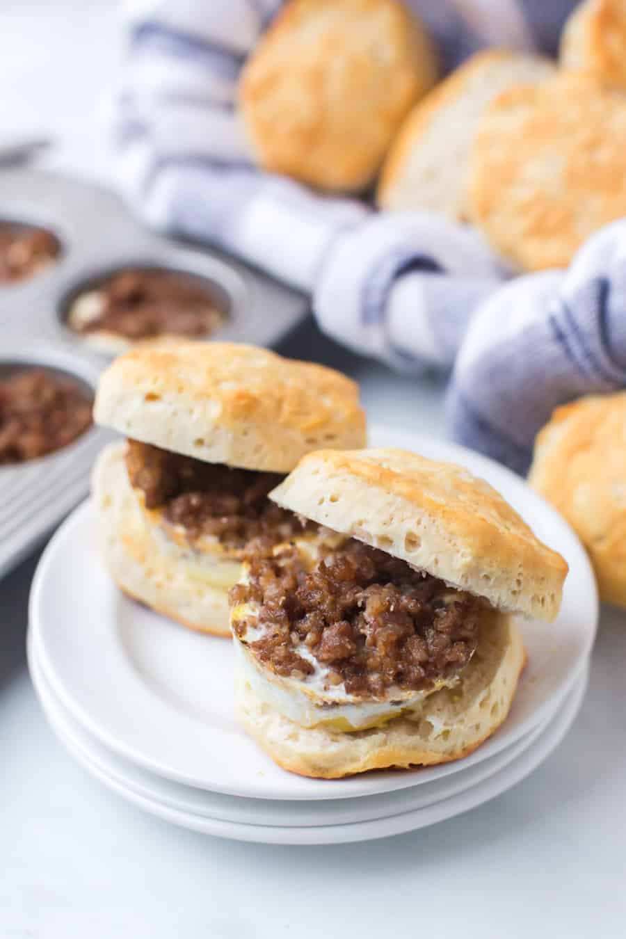 These easy breakfast biscuit sandwiches for a crowd are so simple to throw together for a brunch or if you have visitors, and they're hearty and delicious! #breakfastsandwich #breakfastsammies #breakfast #savorybreakfasts #sandwich
