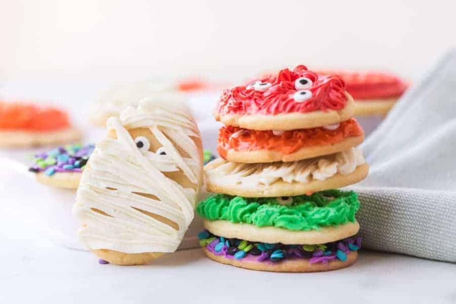 Halloween sugar cookies are adorable, soft, and sweet cookies that are sure to create wonderful memories baking with your family and festive treats for this spooky holiday! As a lover of sweets, I'm of the firm belief that sugar cookies aren't just for Christmas, and candy isn't just for Halloween! Celebrate this fun (and sometimes spooky) holiday by baking a big batch of these festive sugar cookies with your loved ones this Halloween season! #sugarcookies #cookies #halloweensugarcookies