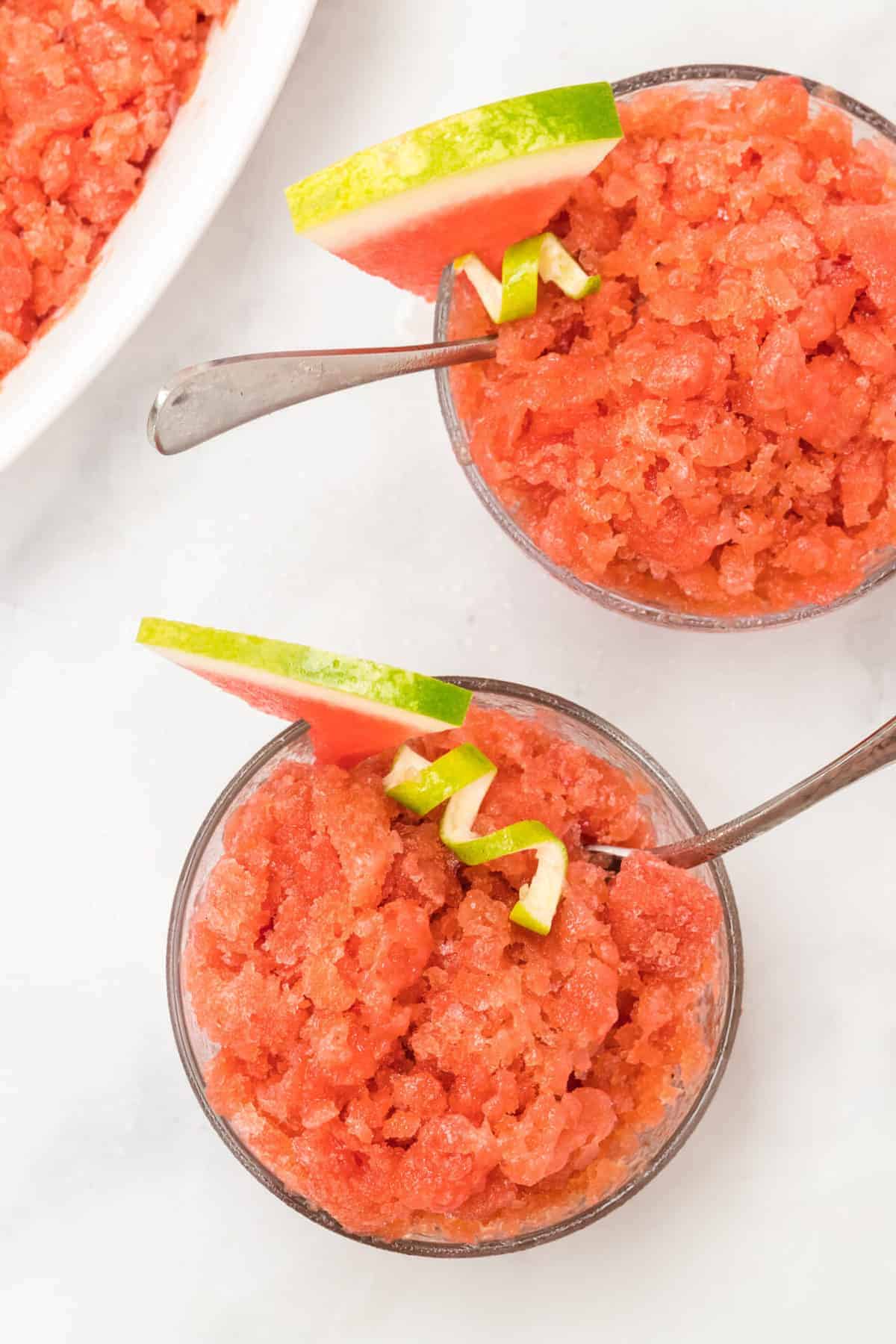 Watermelon Granita is made with only 3 ingredients, and then you just freeze it for a bit! You are going to love this simple dessert recipe all summer long. #summerdesserts #watermelongranita #howtomakegranita #cooldowndesserts #granita #frozenice #watermelon 