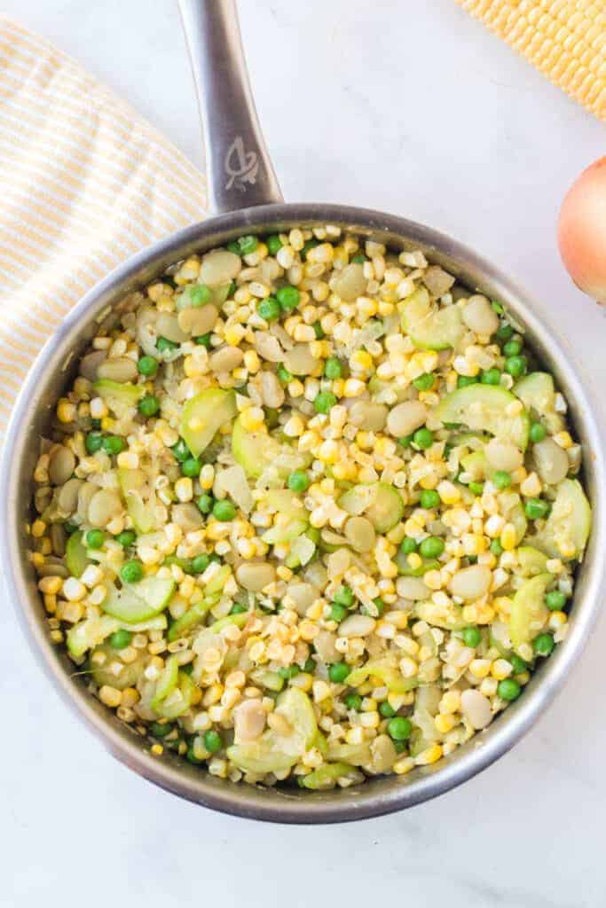 corn and yellow squash side dish in a pot