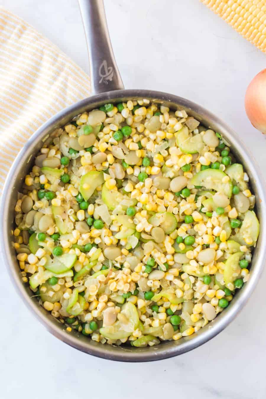 corn and yellow squash side dish in a pot