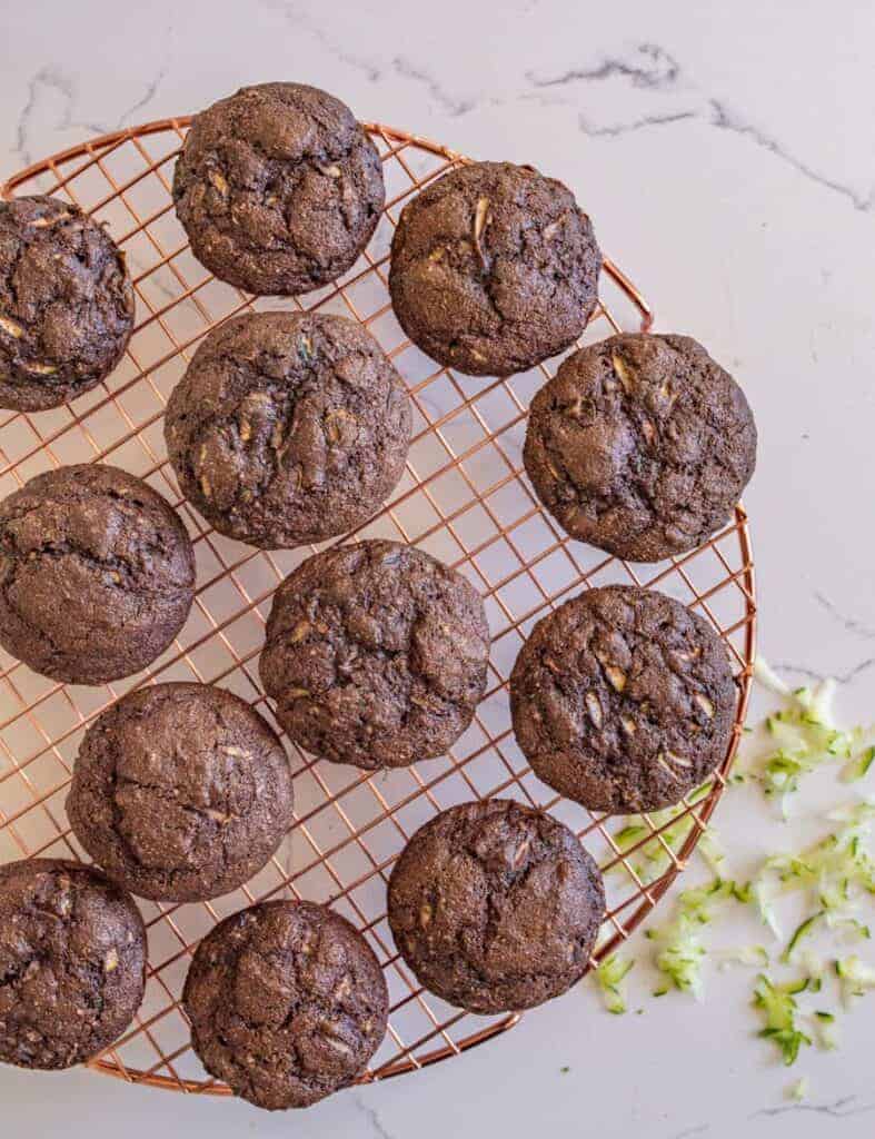 top view of chocolate zucchini muffins on a cooling rack