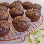 chocolate zucchini muffins on a cooling rack