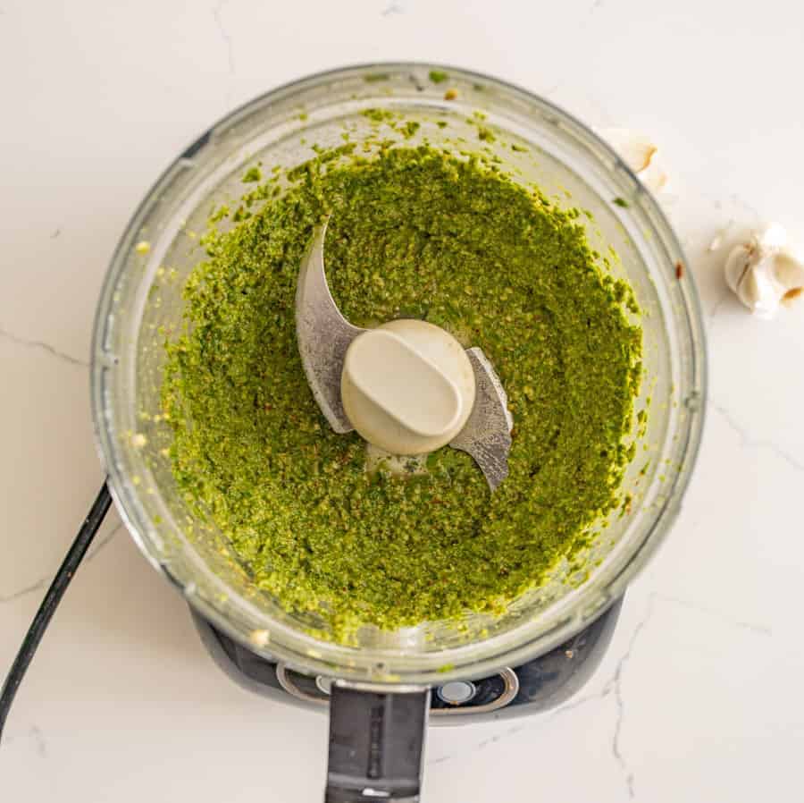 Homemade pesto is a simple and adaptable recipe that you can use as marinade, in sandwiches, on pasta, or over roasted veggies. Plus, it's full of fresh flavors and wholesome ingredients. #pesto #pestorecipe #basil #italian #homemadepesto