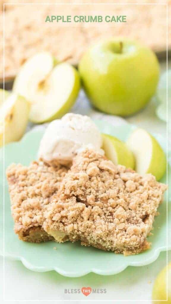 Title Image for Apple Crumb Cake with two squares of apple crumb cake on a plate with vanilla ice cream and apple slices