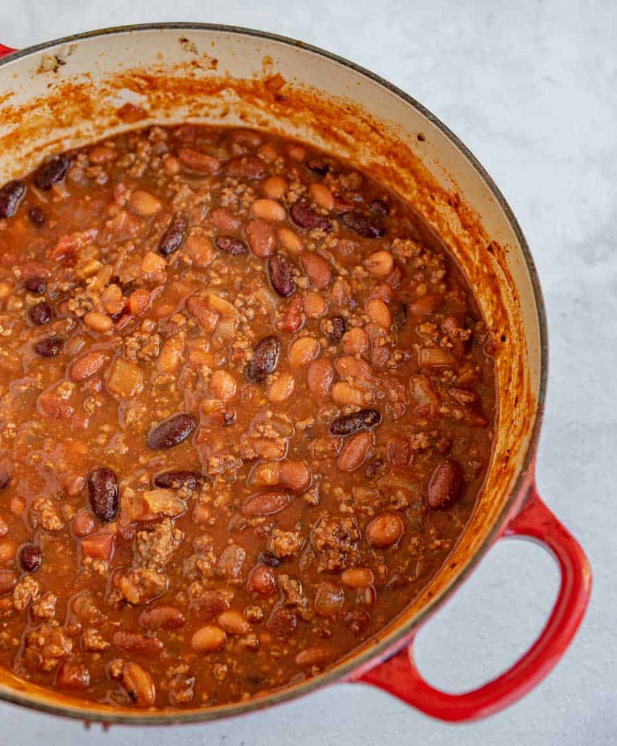 cooked chili in red pot ready to serve