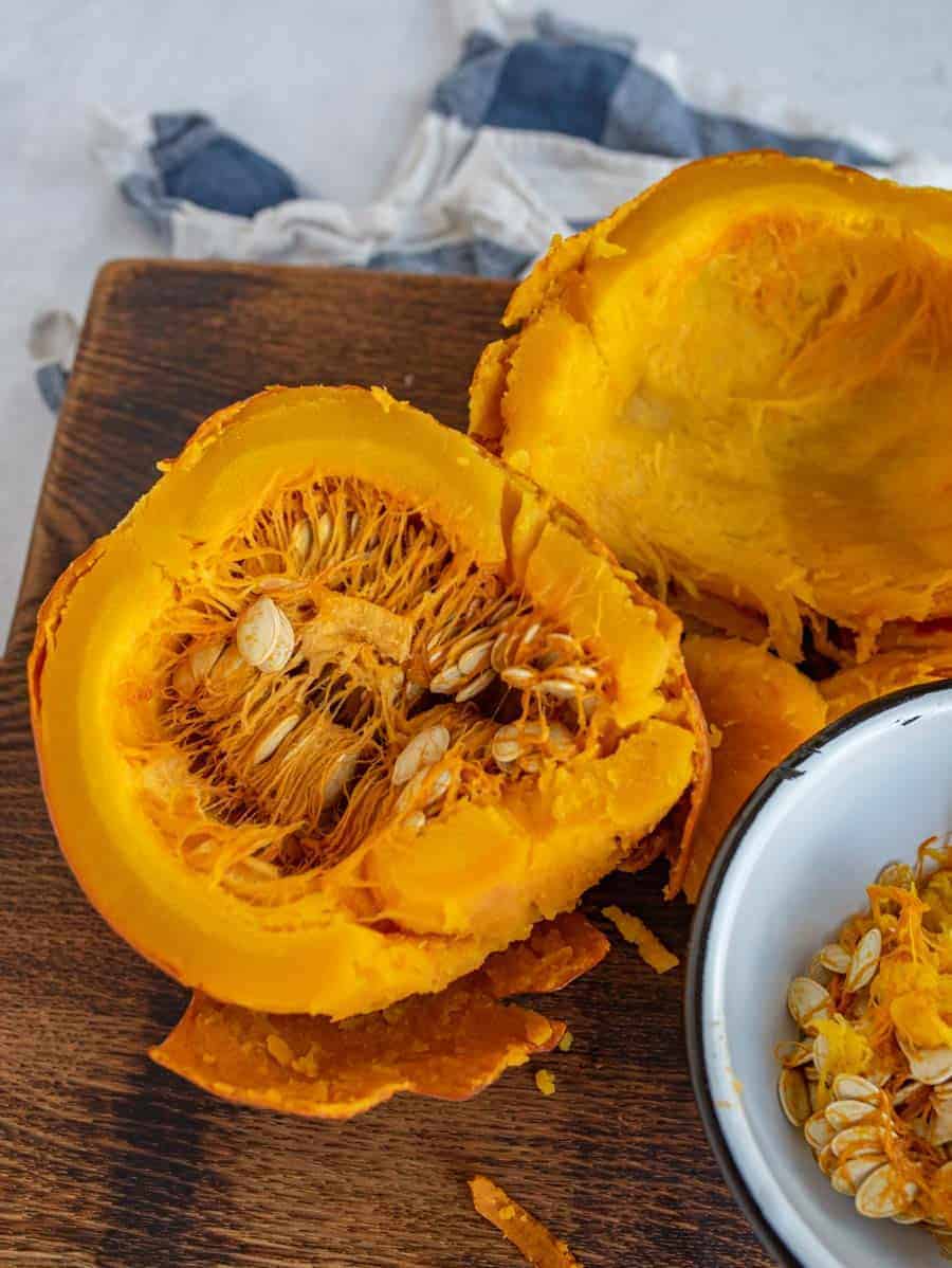 Learn how to cook pumpkin in the Instant Pot with this simple guide, so you can enjoy all the pumpkin soups, pies, and other fall recipes you and your family love! It's a cinch (and so fast) to cook pumpkin in the Instant Pot -- easy enough that you'll find yourself ditching the canned store-bought kind! #pumpkin #pumpkinpuree #pumpkinrecipes #pumpkininstantpot #instantpot #instantpotrecipes