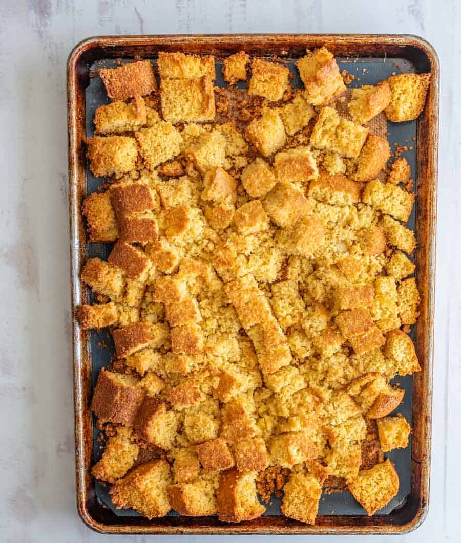 Cornbread stuffing is a crumbly and flavor-packed holiday side dish that's simple to prepare and delicious to enjoy! With sausage, onion, apple, and celery to complete it, this cornbread stuffing is chock-full of fall flavors and is majorly easy to whip up as a side for your holiday feast. #stuffing #dressing #cornbreadstuffing #cornbreaddressing #cornbread #thanksgivingsides #thanksgiving #thanksgivingrecipes #holidayrecipes