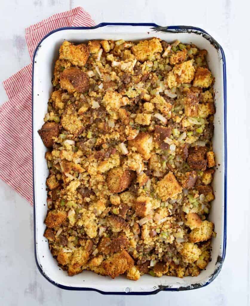 top view of close up of cornbread dressing in white dish