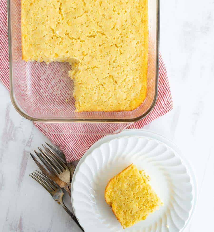 top view of corn casserole in a square glass dish