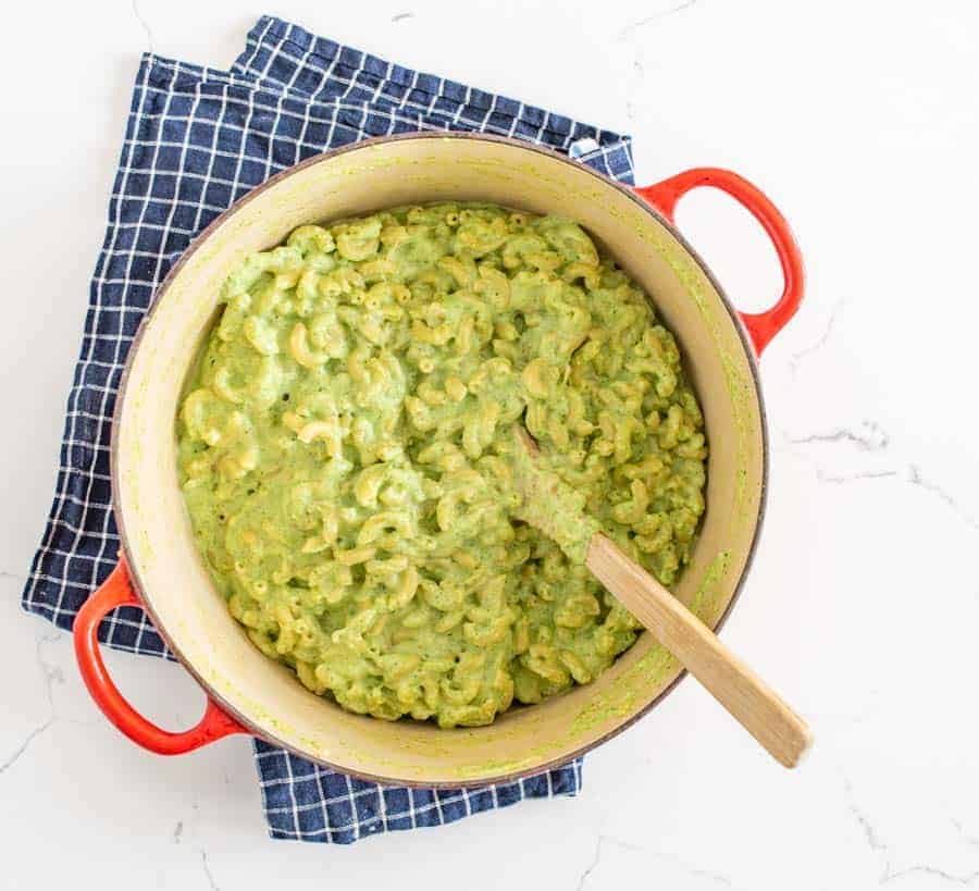 This delicious broccoli macaroni and cheese recipe is such a fun and creative take on the comfort food staple, and a simple, tasty way to get more green on your plate! It doesn't look like your typical mac and cheese with the green color from broccoli, so I like to break this out around Halloween and call it "toxic waste mac and cheese" for something spooky and fun! #broccolimacandcheese #broccoli #macandcheese #macaroniandcheese #halloweenrecipes 