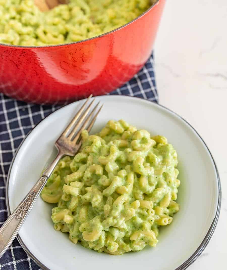 This delicious broccoli macaroni and cheese recipe is such a fun and creative take on the comfort food staple, and a simple, tasty way to get more green on your plate! It doesn't look like your typical mac and cheese with the green color from broccoli, so I like to break this out around Halloween and call it "toxic waste mac and cheese" for something spooky and fun! #broccolimacandcheese #broccoli #macandcheese #macaroniandcheese #halloweenrecipes 