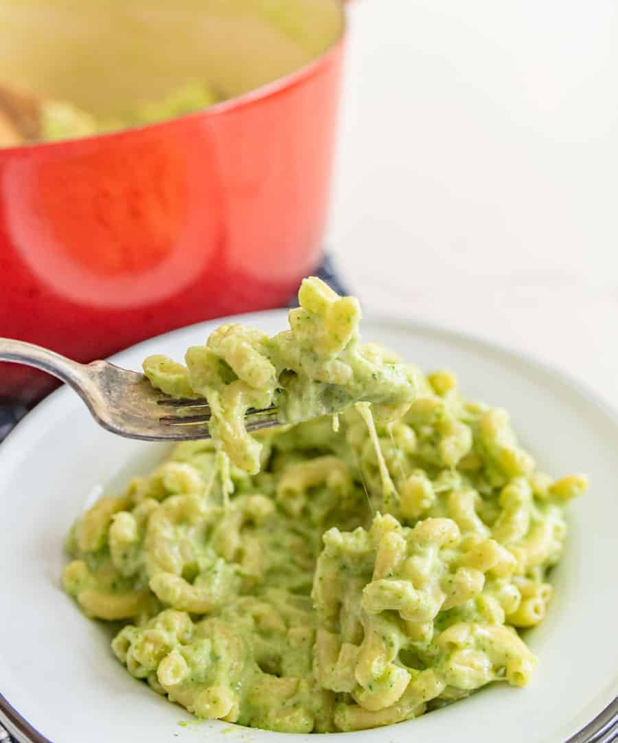 This delicious broccoli macaroni and cheese recipe is such a fun and creative take on the comfort food staple, and a simple, tasty way to get more green on your plate! It doesn't look like your typical mac and cheese with the green color from broccoli, so I like to break this out around Halloween and call it "toxic waste mac and cheese" for something spooky and fun! #broccolimacandcheese #broccoli #macandcheese #macaroniandcheese #halloweenrecipes 