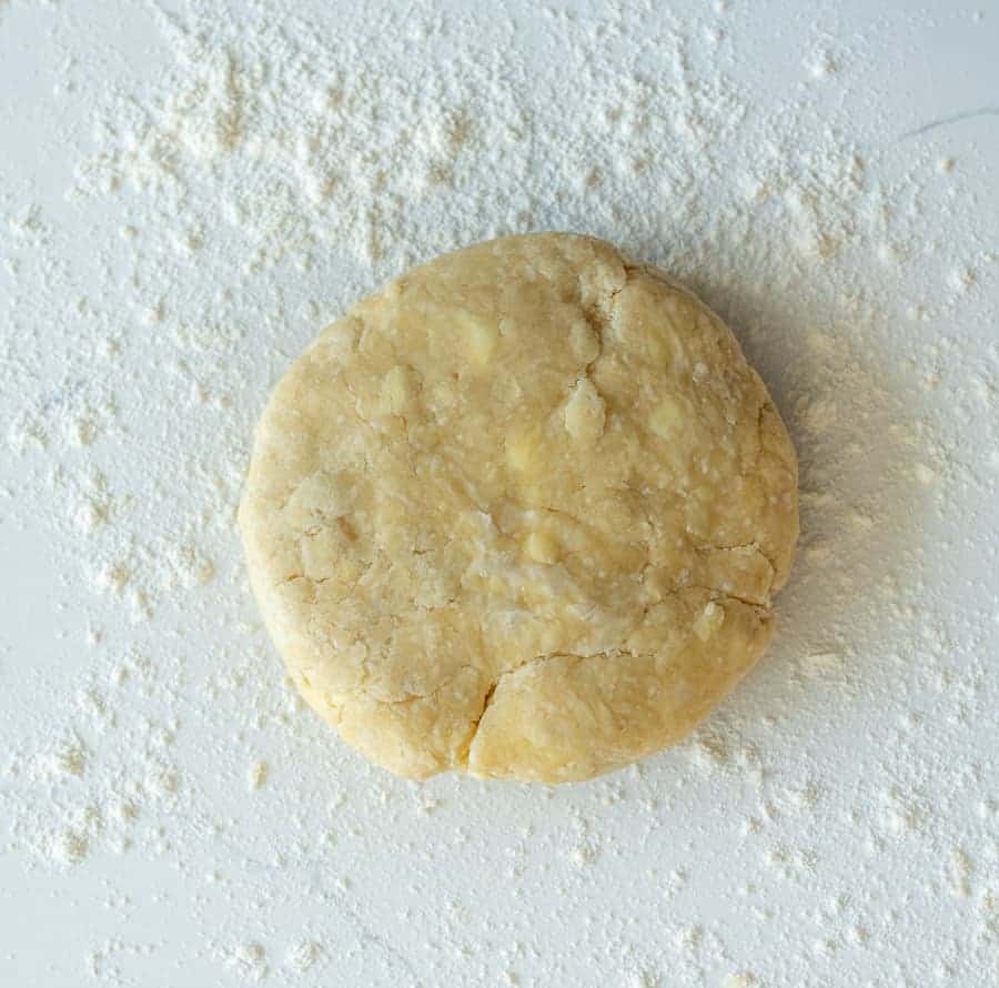 pie crust dough with chunks of butter