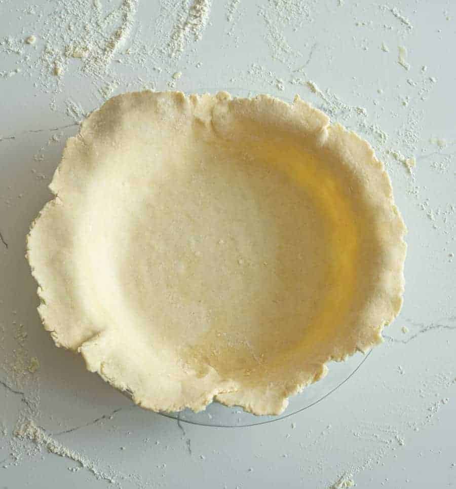 rolled out pie crust in pie tin