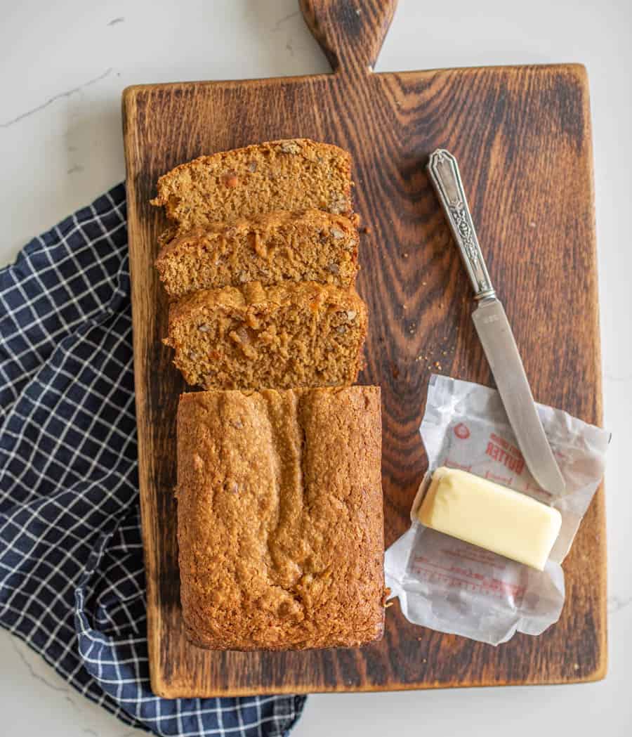 This sweet potato bread is a moist and warming pastry that's the perfect cozy snack or breakfast for cool fall days. If you can make banana bread (which everyone can!), then you'll ace this homemade sweet potato bread recipe that's so simple and tastes like a treat even though there's a veggie-superfood inside! #sweetpotatobread #sweetpotato #baking #homemadebread #sweetpotatorecipes