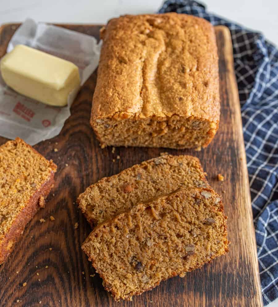 This sweet potato bread is a moist and warming pastry that's the perfect cozy snack or breakfast for cool fall days. If you can make banana bread (which everyone can!), then you'll ace this homemade sweet potato bread recipe that's so simple and tastes like a treat even though there's a veggie-superfood inside! #sweetpotatobread #sweetpotato #baking #homemadebread #sweetpotatorecipes