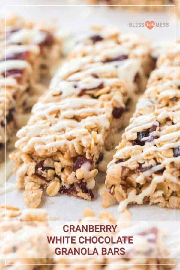 White chocolate and cranberry granola bars are the perfect grab-and-go snack, and they are so simple to make at the beginning of the week to have on the go all week long. I love a granola bar because it's packed with nutrients and vitamins, and these ones taste indulgent even though they're full of nutritious ingredients! #granolabars #homemadegranolabars #cranberrywhitechocolate #proteinbars #snack #homemadesnack #snackrecipes