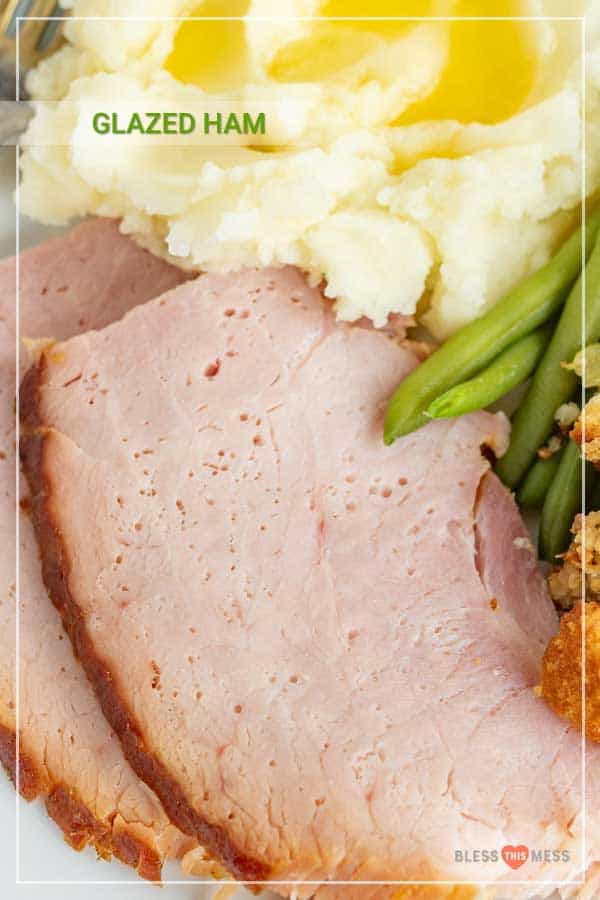 Brown sugar glazed ham is an easy, flavorful recipe for juicy ham with a sweet and salty, caramelized outside, perfect to serve to a crowd for a holiday meal. Ham is a holiday meal staple, and this simple recipe gives you all the tools to glaze your own at home for big flavor and a satisfying and delicious end product. #glazedham #brownsugarglazedham #ham #holidayham #hamrecipe #holidayfood #holidayrecipes #thanksgivingrecipes