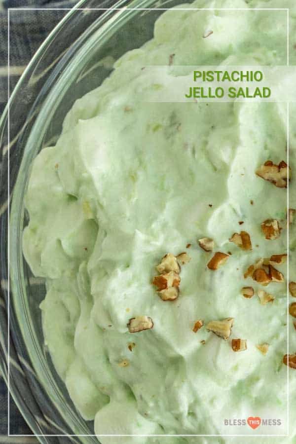 close up of pistachio jello salad with walnuts on top