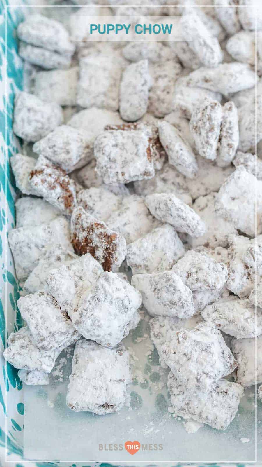 Puppy chow with peanut butter, chocolate, Chex, and powdered sugar is one of the most fun sweet treats ever, and it comes together quickly for a crunchy dessert, easy goody bag, or delicious after-school snack! This homemade puppy chow recipe is one of the simplest and most fun treats to make. I love getting the kids involved because it's so straightforward and a great way to get them interested in cooking and baking! #puppychowrecipe #puppychow #muddybuddies #chexcereal #simpledesserts