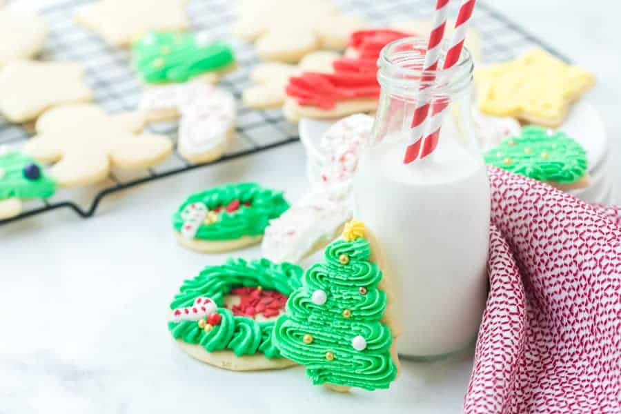 These perfect sugar cookies are moist and soft but keep their shape well, and are perfect for any holiday occasion! They're simple to make, too. Just make the dough, chill it, roll it, shape it, and bake it! And of course, don't forget to decorate it. #sugarcookies #sugarcookie #sugarcookierecipe #baking #cookies #cookierecipe #christmascookies