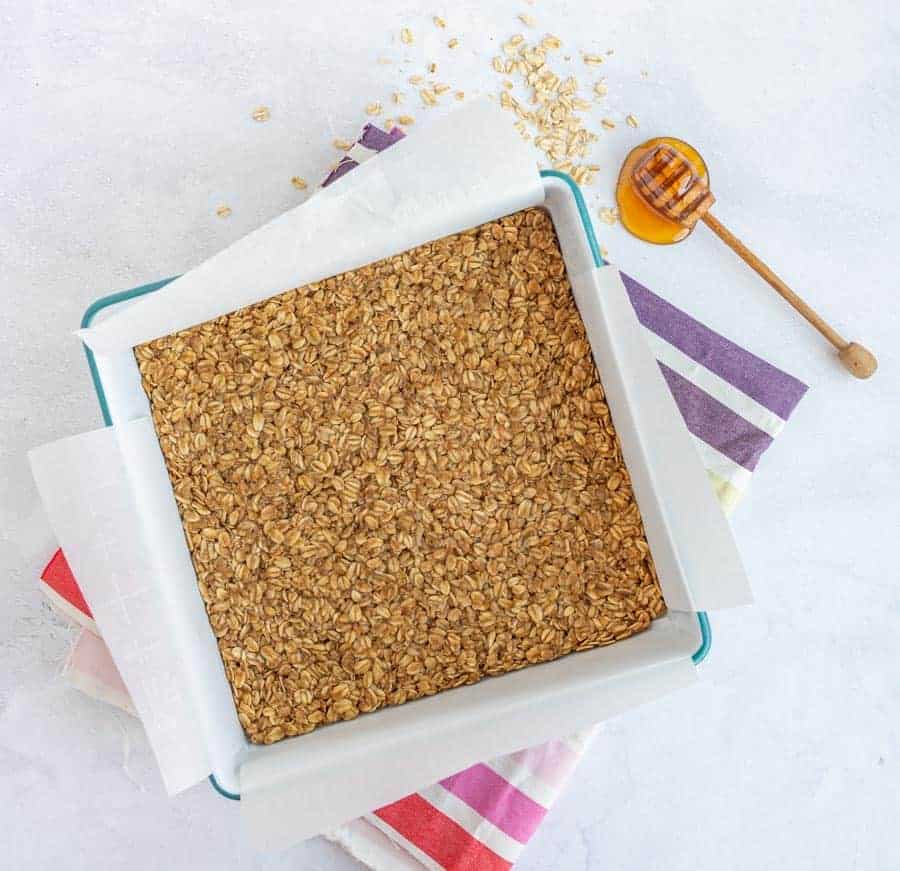 easy homemade granola bars in white dish with honeycomb