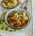 two bowls of easy vegetable curry with spoons