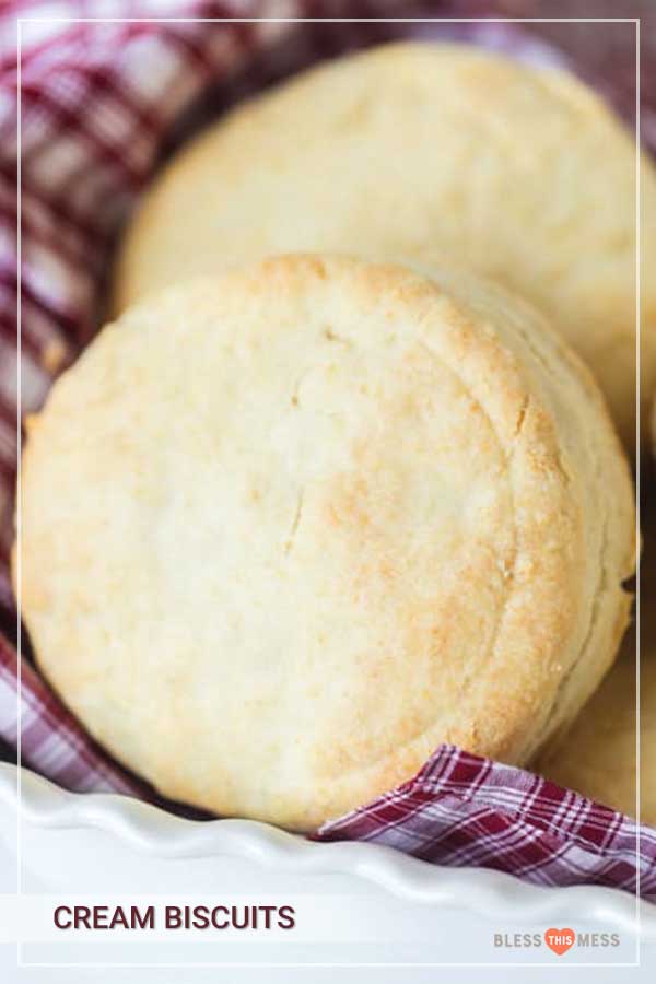 cream biscuits in red and white towel