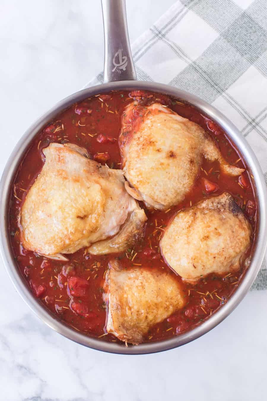 chicken thighs in garlic tomato sauce