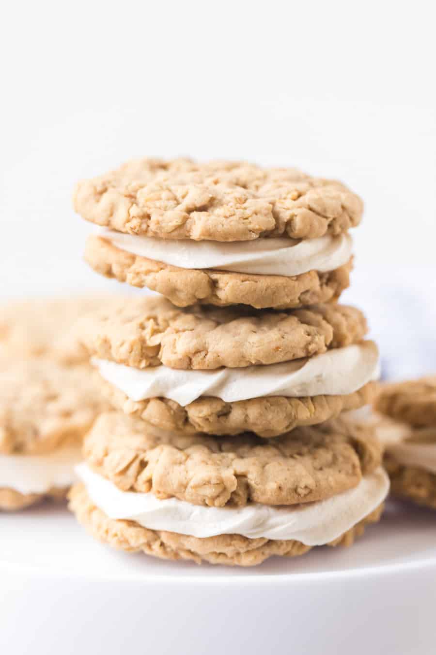stack of homemade oatmeal sandwich cookies with white background