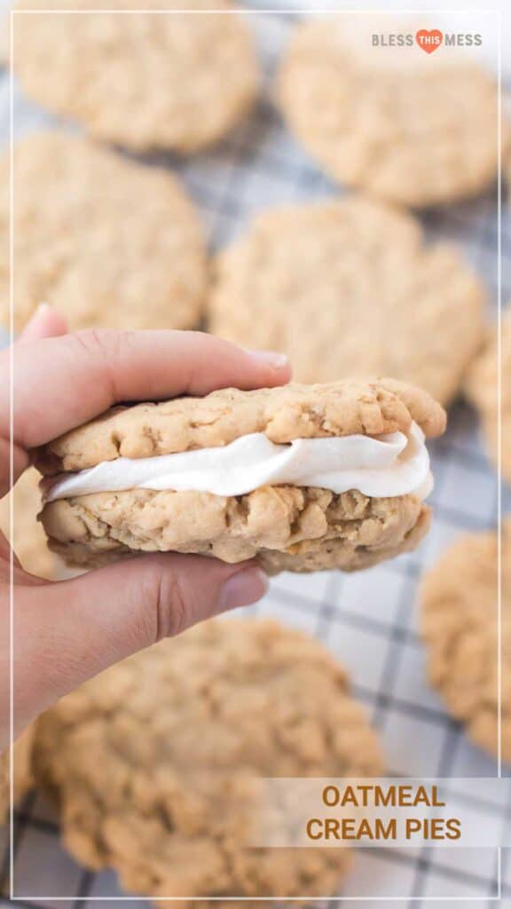 woman holding oatmeal cream pie with marshmallow fluff