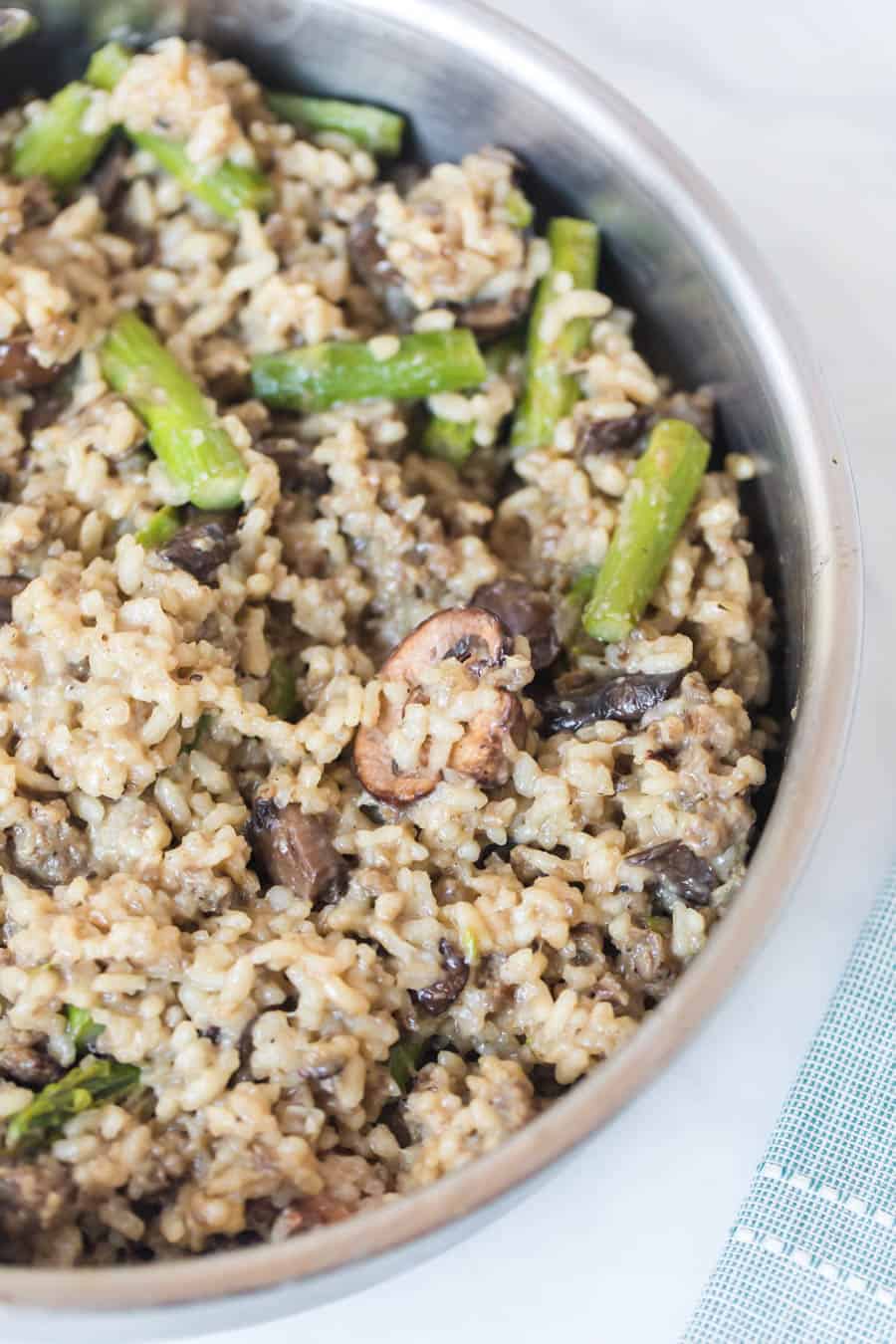 closeup image of Sausage Asparagus and Mushroom Risotto in pan