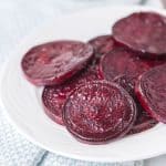 pile of roasted beet slices on a white plate