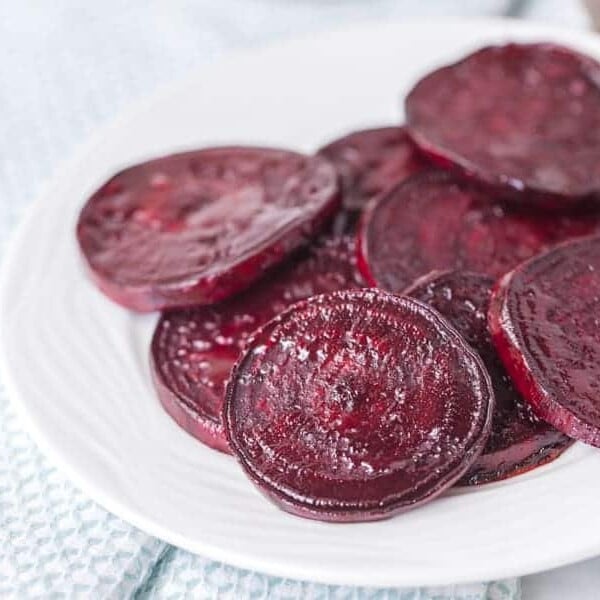 pile of roasted beet slices on a white plate