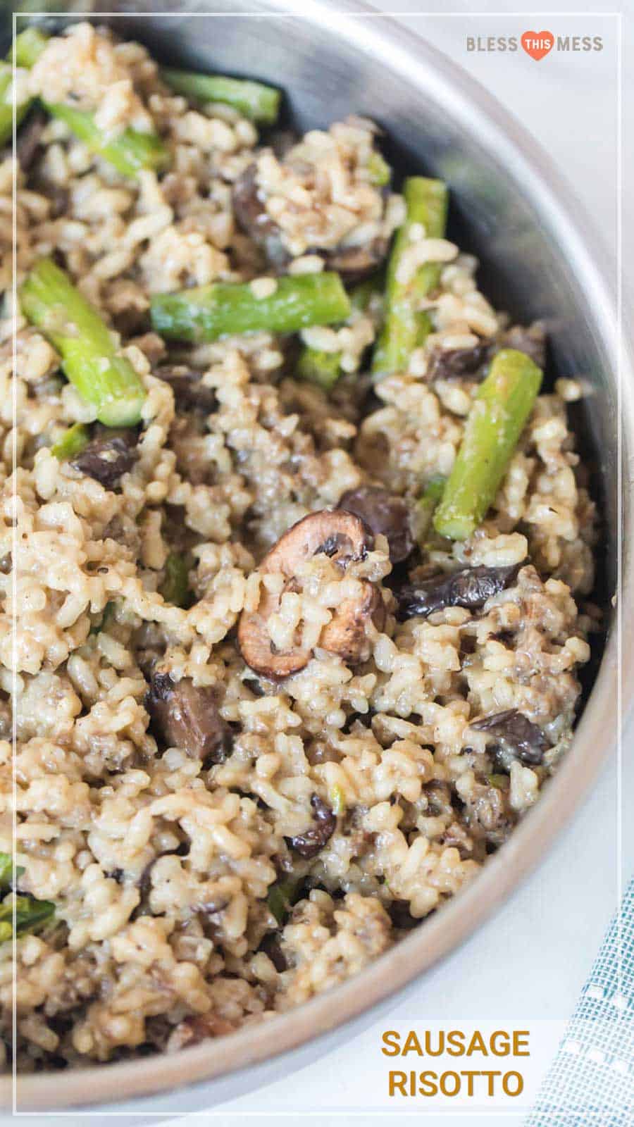 sausage risotto with asparagus in aluminum pan