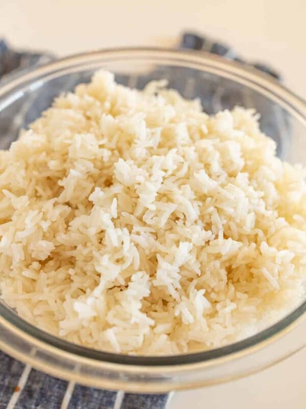white rice in glass bowl