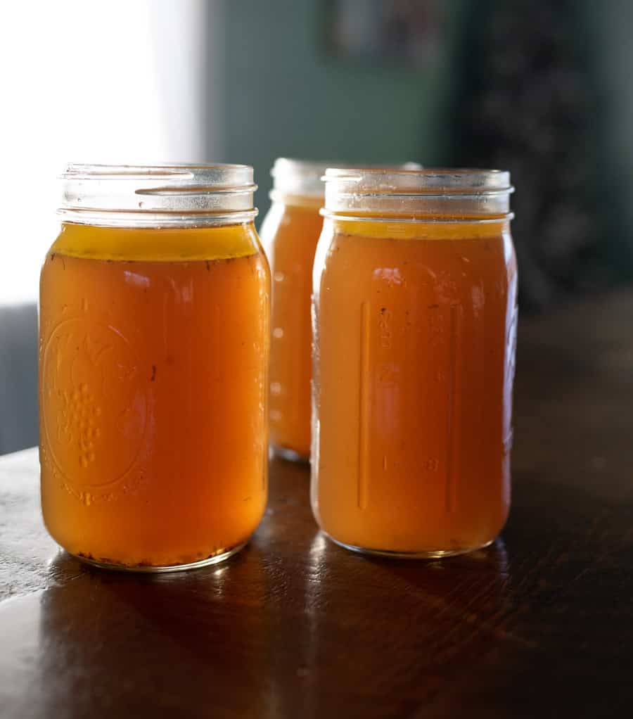 three canning jars of beef bone broth