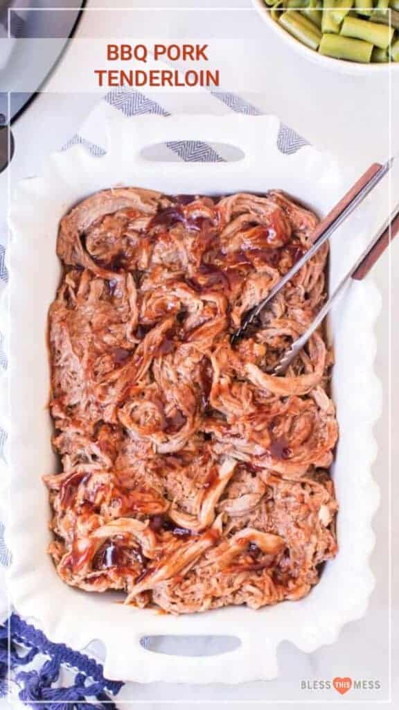 white casserole dish filled with bbq pulled pork