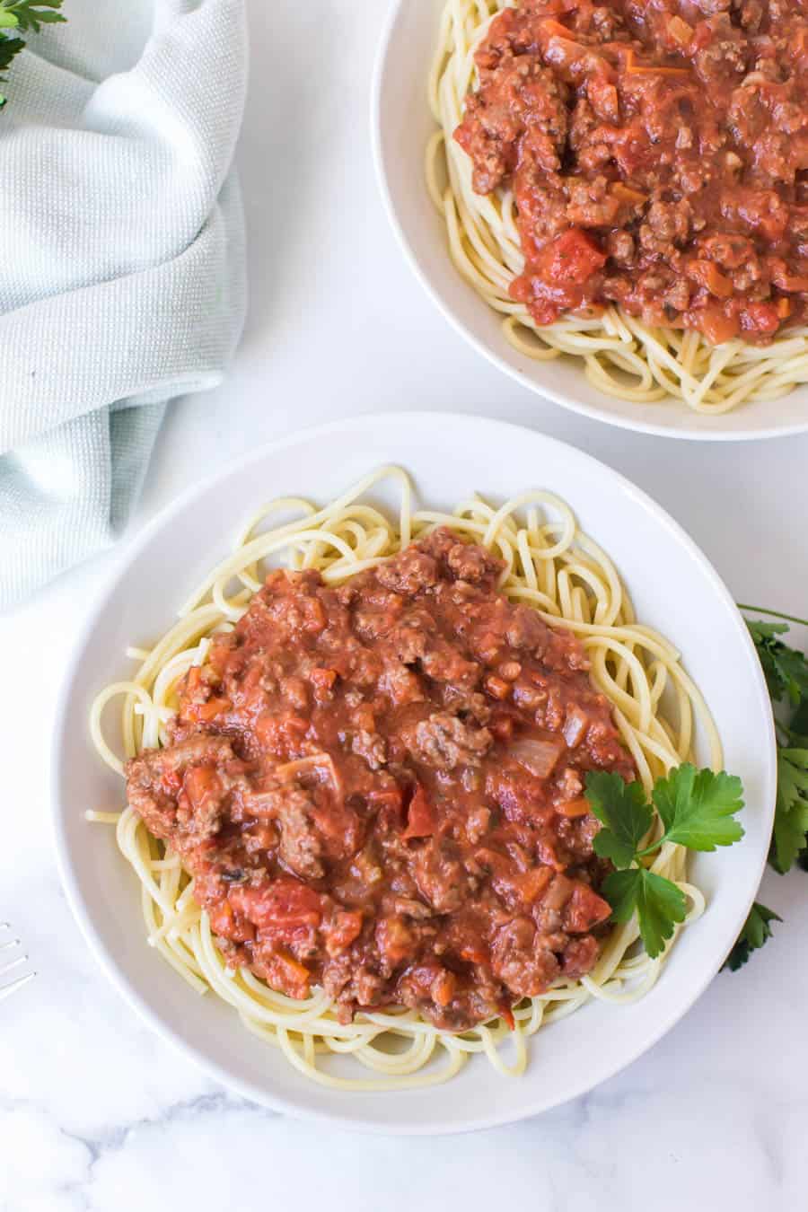 bolognese sauce over spaghetti pasta