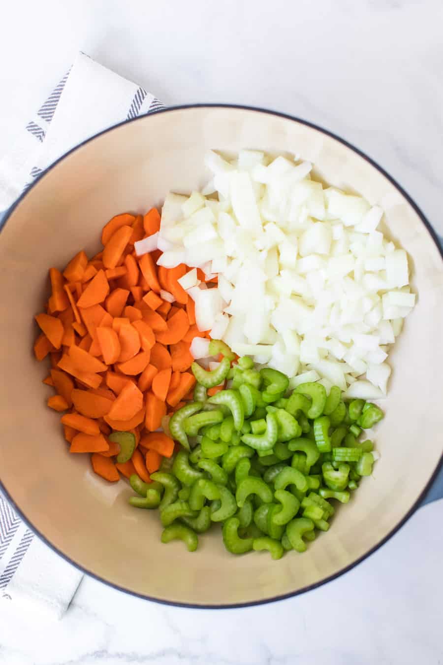 pot of chopped onions celery and carrots for homemade bolognese sauce