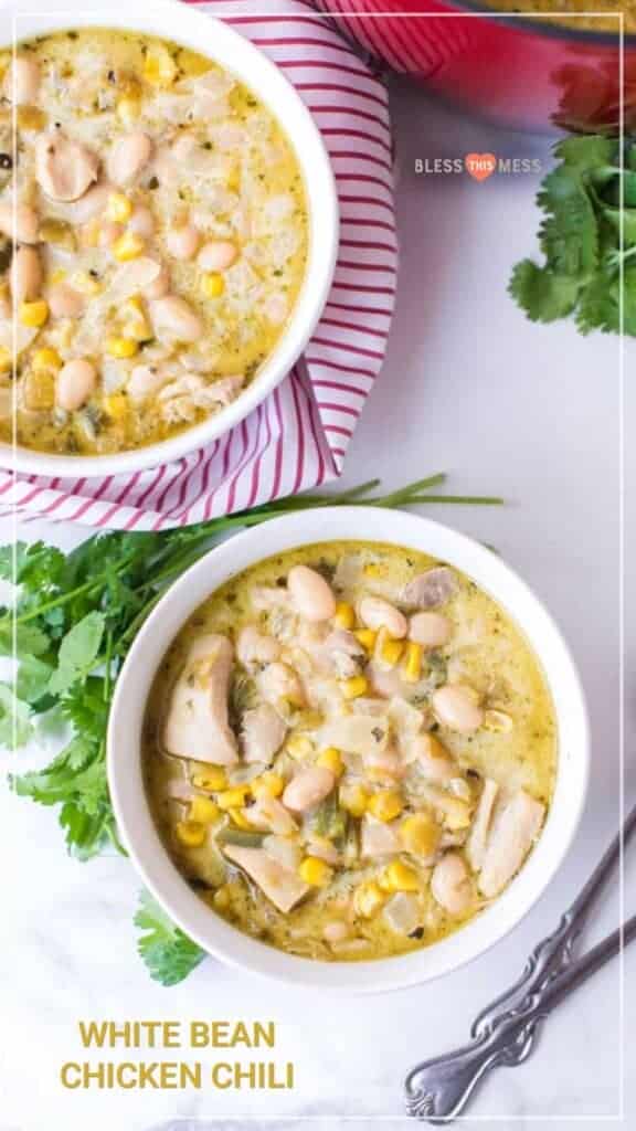 two white bowls filled with white bean chicken chili