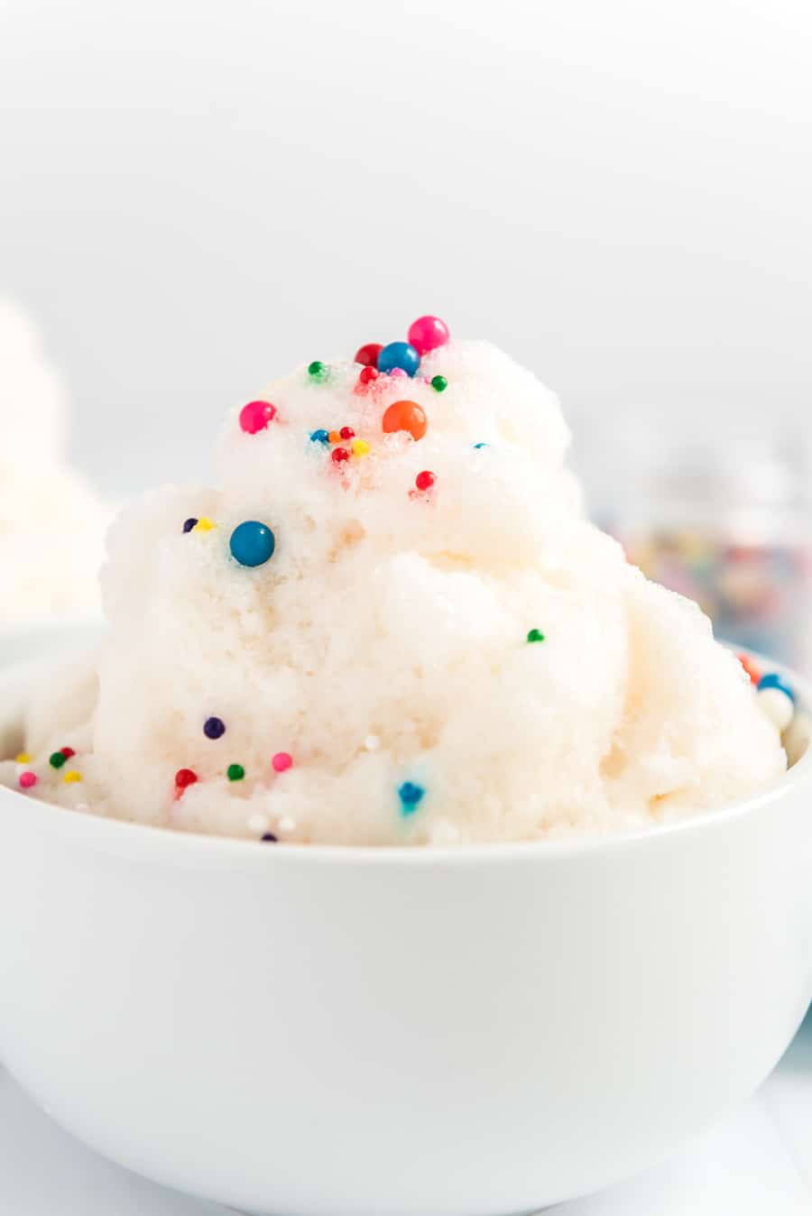 white bowl with snow cream and sprinkles