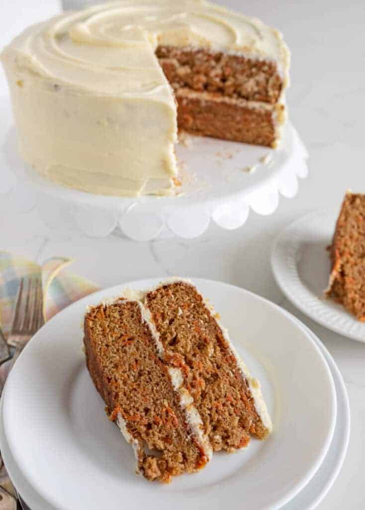 slices of carrot cake taken from the 2 tier cake