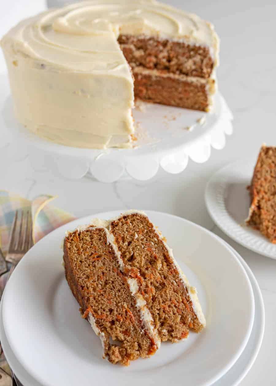 slices of carrot cake taken from the 2 tier cake