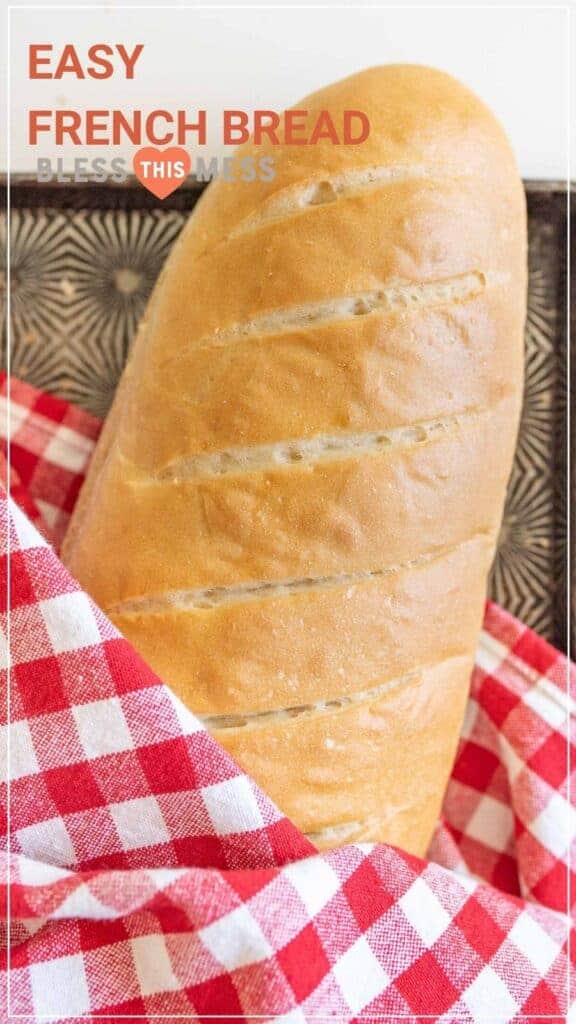 easy french bread loaf wrapped in red checkered towel pin